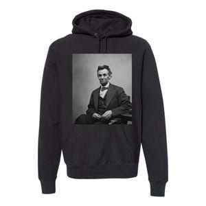 Abraham Lincoln Seated And Holding His Spectacles And A Pencil On Feb 1865 Premium Hoodie