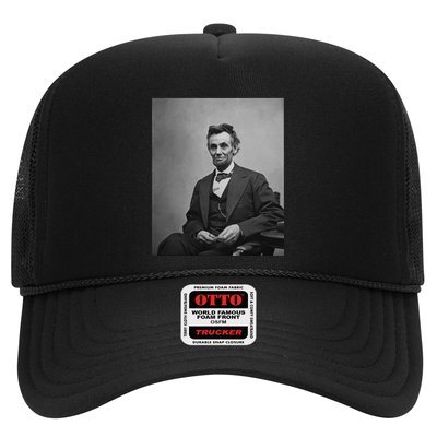 Abraham Lincoln Seated And Holding His Spectacles And A Pencil On Feb 1865 Trucker Hat