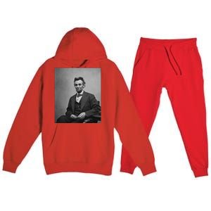 Abraham Lincoln Seated And Holding His Spectacles And A Pencil On Feb 1865 Premium Hooded Sweatsuit Set