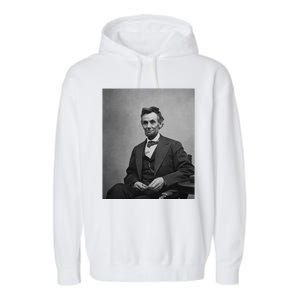 Abraham Lincoln Seated And Holding His Spectacles And A Pencil On Feb 1865 Garment-Dyed Fleece Hoodie