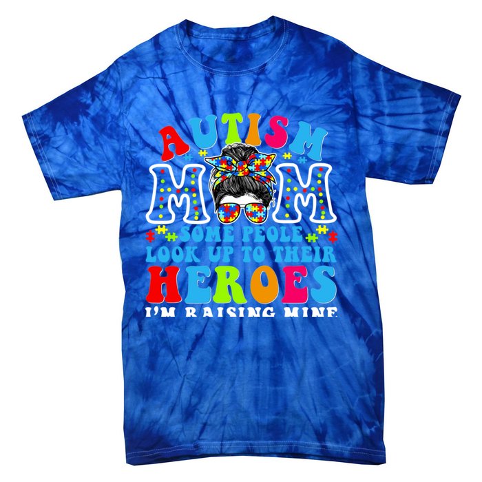 Autism Mom Raising Hero Groovy Messy Bun Autism Awareness Gift Tie-Dye T-Shirt