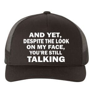 And Yet Despite The Look On My Face You're Still Talking Yupoong Adult 5-Panel Trucker Hat