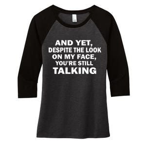 And Yet Despite The Look On My Face You're Still Talking Women's Tri-Blend 3/4-Sleeve Raglan Shirt