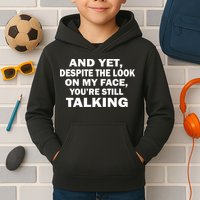 And Yet Despite The Look On My Face You're Still Talking Kids Hoodie