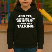 And Yet Despite The Look On My Face You're Still Talking Kids Hoodie