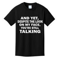 And Yet Despite The Look On My Face You're Still Talking Kids T-Shirt