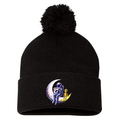 Astronaut Playing Guitar With An Alien On The Moon Pom Pom 12in Knit Beanie