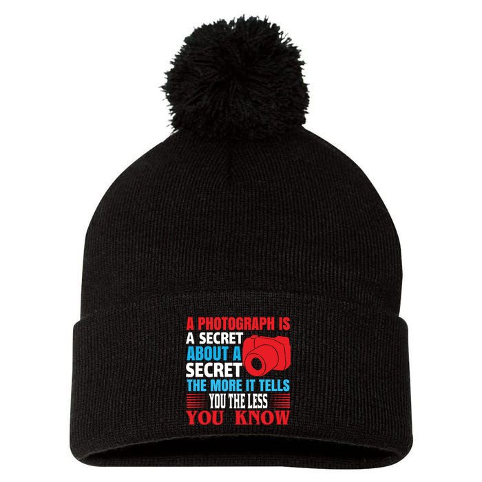 A Photograph Is A Secret About A Secret The More It Tells You The Less You Know Pom Pom 12in Knit Beanie