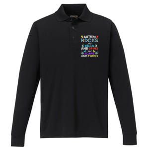 Autism Rocks And Rolls And Spins And Flaps And Twists Performance Long Sleeve Polo