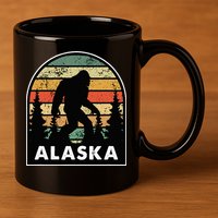 Alaska With A Bigfoot Or A Sasquatch 11oz C Handle Ceramic Mug