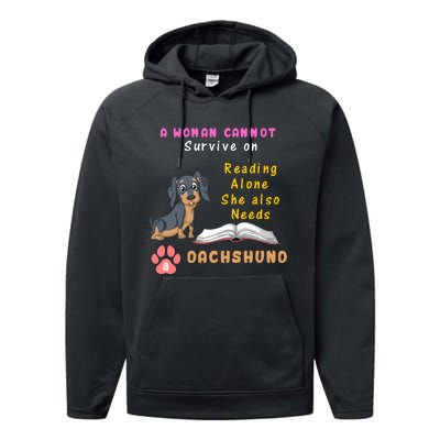 A Woman Cannot Reading Alone She Also Needs A Dachshund Performance Fleece Hoodie