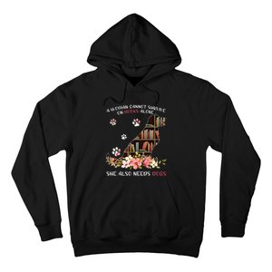 A Woman Cannot Survive On Books Alone She Also Needs Dogs Hoodie