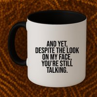 And Yet Despite The Look On My Face YouRe Still Talking Funny Mug