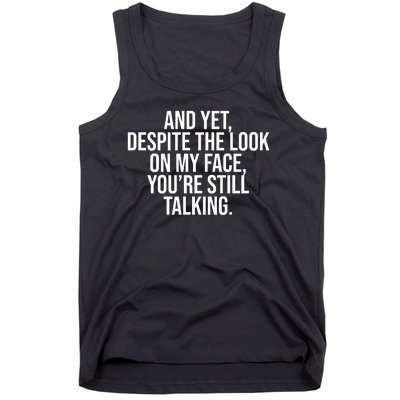 And Yet Despite The Look On My Face YouRe Still Talking Funny Tank Top