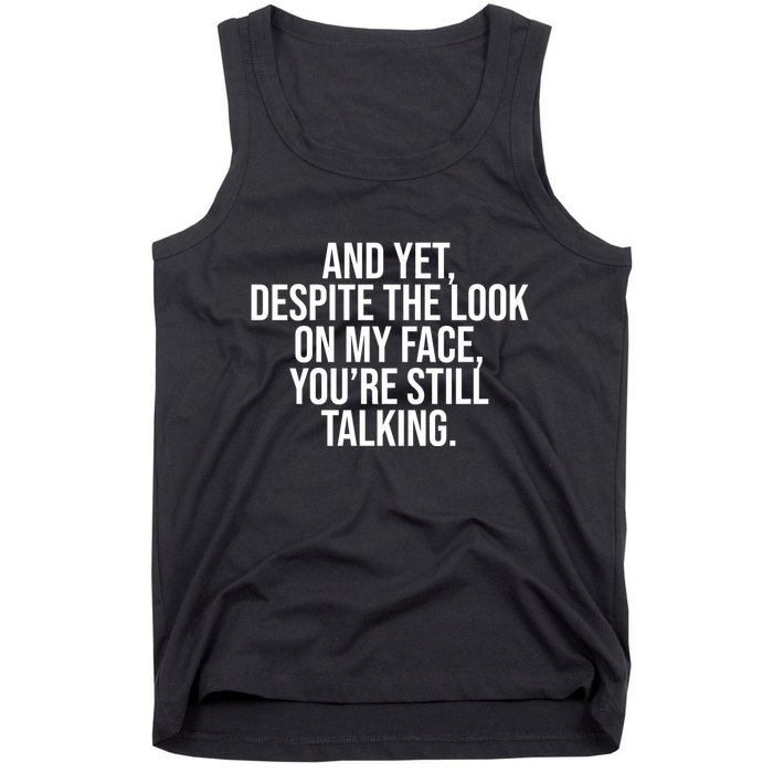 And Yet Despite The Look On My Face YouRe Still Talking Funny Tank Top