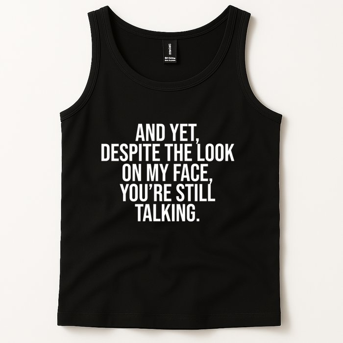 And Yet Despite The Look On My Face YouRe Still Talking Funny Tank Top