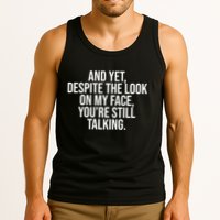 And Yet Despite The Look On My Face YouRe Still Talking Funny Tank Top