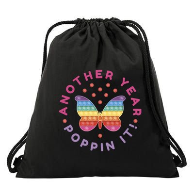 Another Year Poppin It Butterfly Push Pop Drawstring Bag
