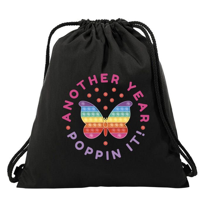 Another Year Poppin It Butterfly Push Pop Drawstring Bag