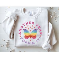 Another Year Poppin It Butterfly Push Pop Sweatshirt