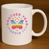 Another Year Poppin It Butterfly Push Pop 11oz C Handle Ceramic Mug