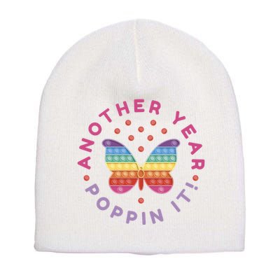 Another Year Poppin It Butterfly Push Pop Short Acrylic Beanie