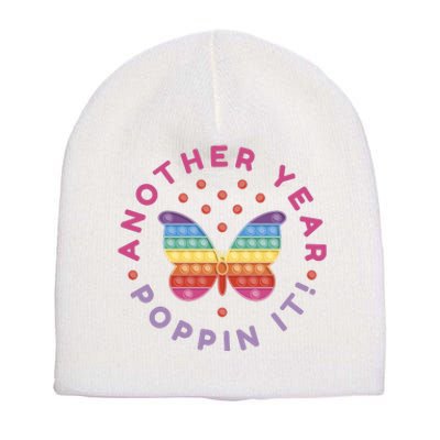 Another Year Poppin It Butterfly Push Pop Short Acrylic Beanie