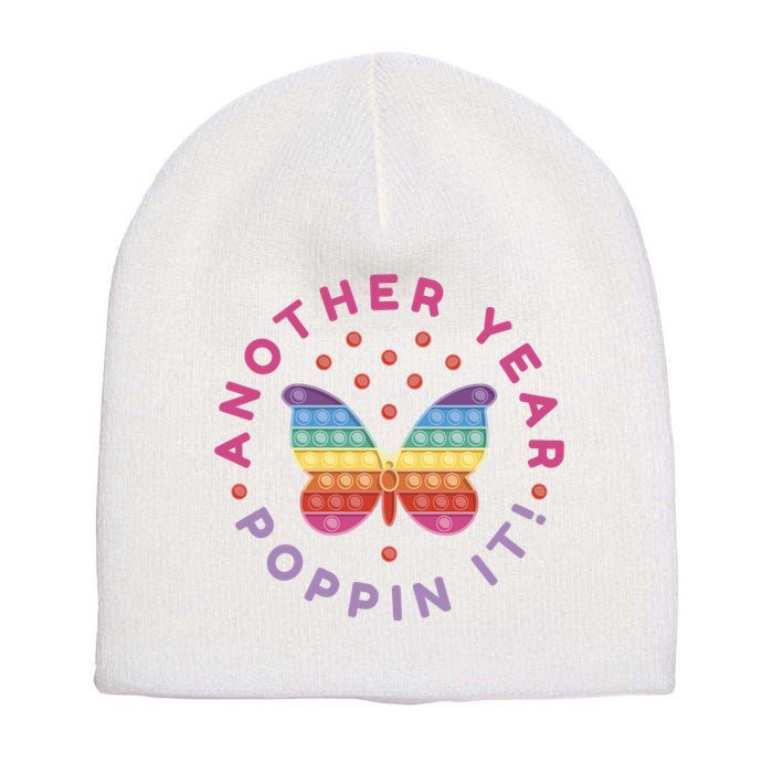 Another Year Poppin It Butterfly Push Pop Short Acrylic Beanie