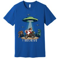 Believe Bigfoot Dinosaur Santa And Jesus Riding Bike Christmas Gift Premium T-Shirt