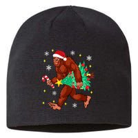 Bigfoot Carrying Christmas Tree Funny Xmas 2021 Sasquatch Sustainable Beanie