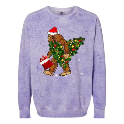 Bigfoot Carrying Christmas Tree Sasquatch Believer Pajama Colorblast Crewneck Sweatshirt