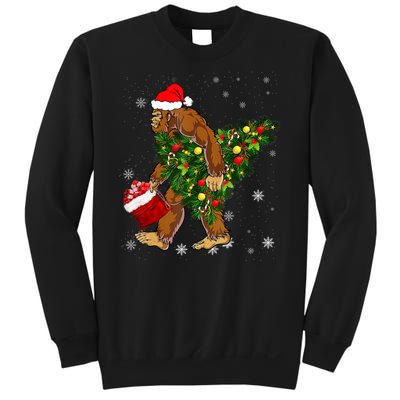 Bigfoot Carrying Christmas Tree Sasquatch Believer Pajama Sweatshirt