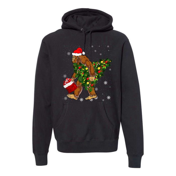 Bigfoot Carrying Christmas Tree Sasquatch Believer Pajama Premium Hoodie