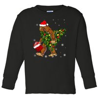 Bigfoot Carrying Christmas Tree Sasquatch Believer Pajama Toddler Long Sleeve Shirt