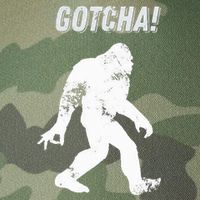 Bigfoot Circle Game Gotcha Meme Ok Hand Legacy Tie Dye Trucker Hat