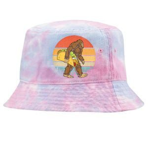 Bigfoot Carrying Taco Funny Cinco De Mayo Sasquatch Tie-Dyed Bucket Hat