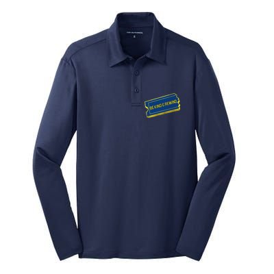 Be Kind And Rewind Silk Touch Performance Long Sleeve Polo