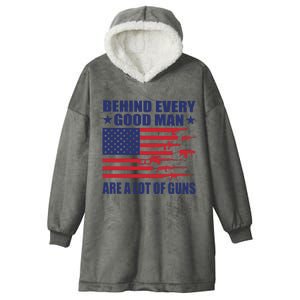 Behind Every Good Man Are A Lot Of Guns Hooded Wearable Blanket