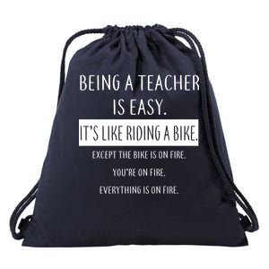 Being A Teacher Is Like Riding A Bike Drawstring Bag