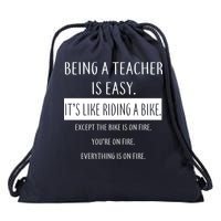 Being A Teacher Is Like Riding A Bike Drawstring Bag