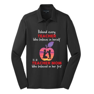 Behind Every Teacher Who Believes In Herself Is Teacher Mom Gift Silk Touch Performance Long Sleeve Polo