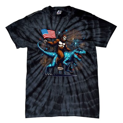 Bigfoot Fireworks Riding A Trex With Usa Flag Tie-Dye T-Shirt