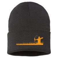 Bow Hunting Archer In Grass Archery Hunter Sustainable Knit Beanie