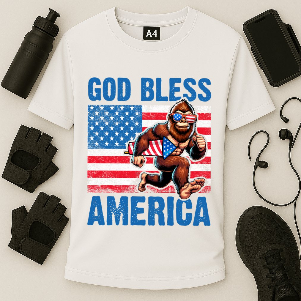 Bigfoot Holding Firework God Bless America Cooling Performance Crew T-Shirt