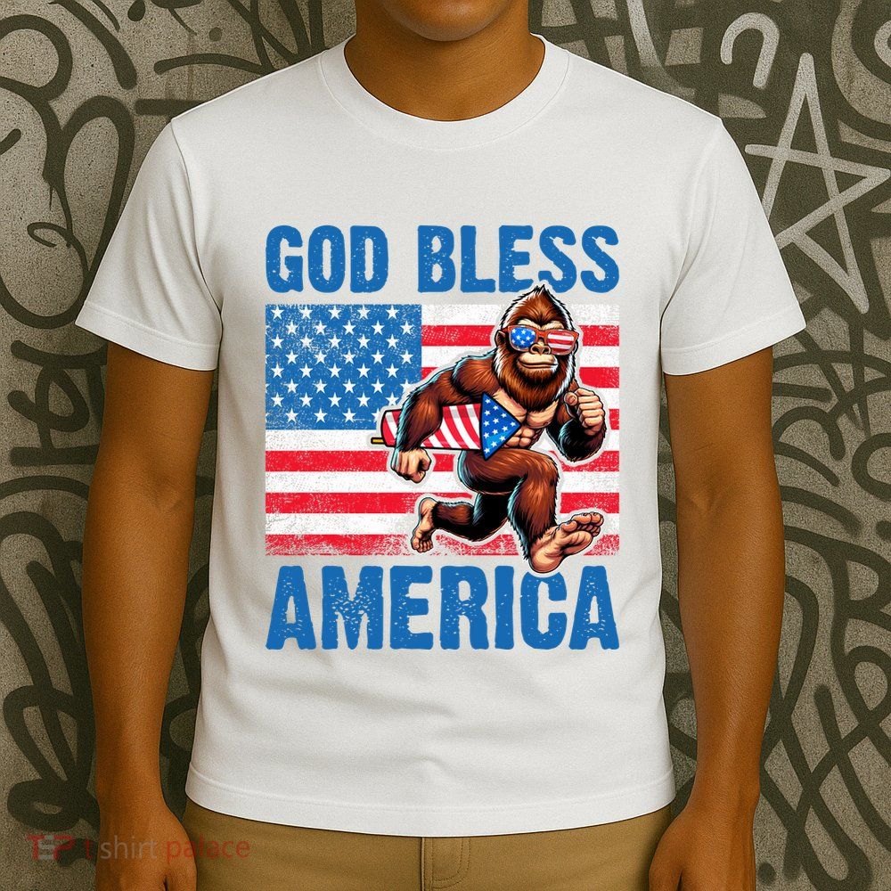 Bigfoot Holding Firework God Bless America T-Shirt