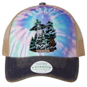 Bigfoot Hiding From Alien In A Ufo Behind A Tree Forest Legacy Tie Dye Trucker Hat