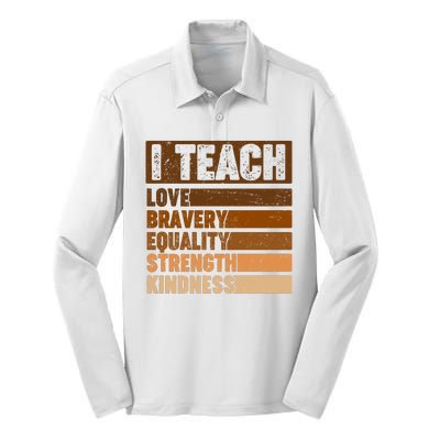 Black History Month I Teach Love Bravery Equality Strength Kindness Silk Touch Performance Long Sleeve Polo