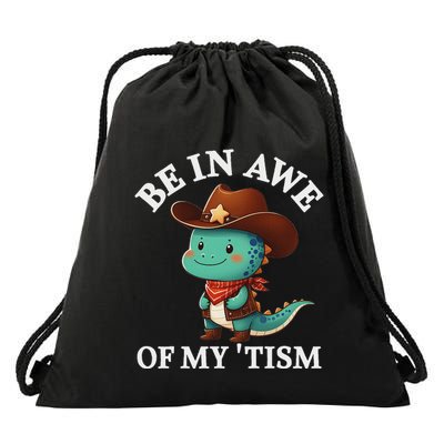 Be In Awe Of My Tism Cute Cowboy Rodeo Dinosaur Autism Drawstring Bag