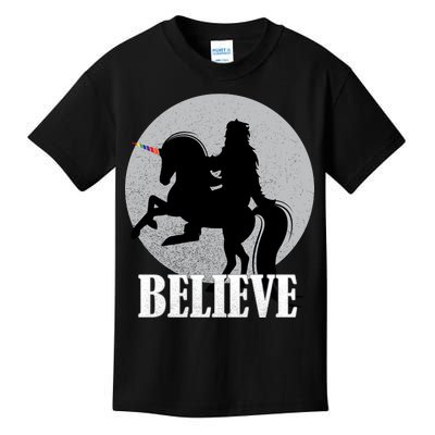 Bigfoot Riding Unicorn Believe Kids T-Shirt