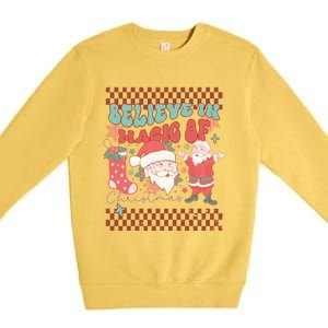 Believe In Magic Of Christmas Groovy Retro Christmas Santa Funny Gift Premium Crewneck Sweatshirt